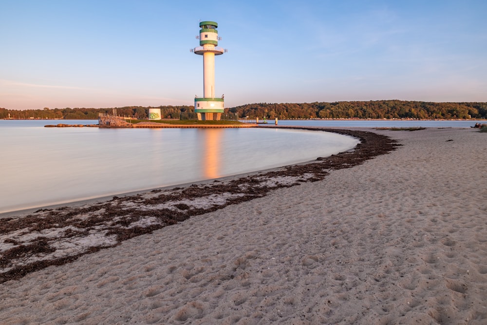 a lighthouse on a beach