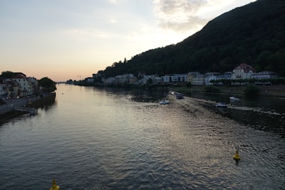 The serene view from the hotel balcony overlooking the Ganges river at sunset.
