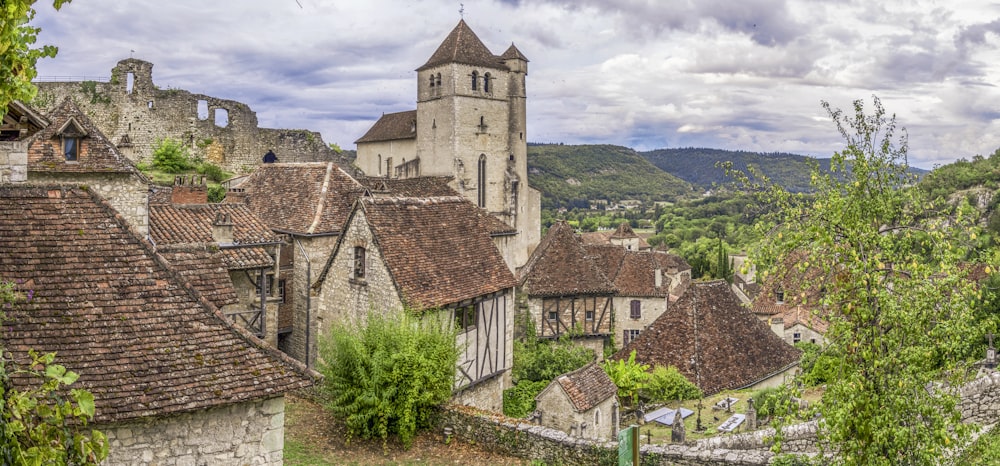 a group of houses with a tower