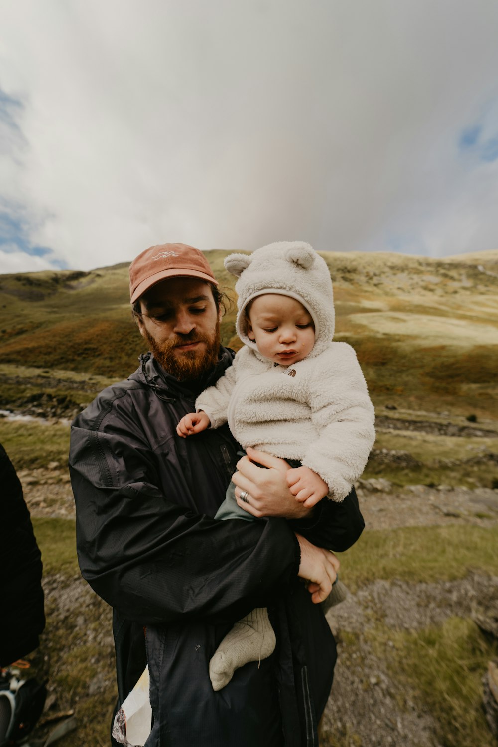 a person holding a baby