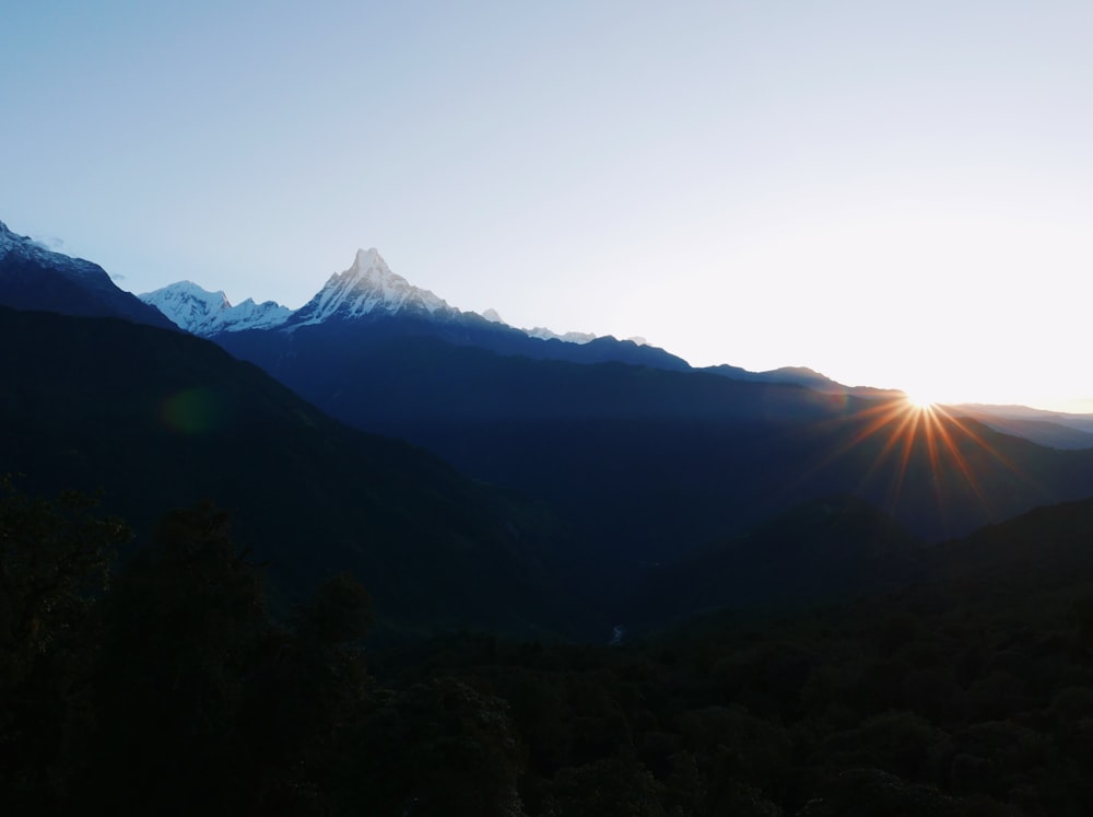 a mountain with a snow capped peak