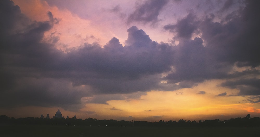 a cloudy sky over a city