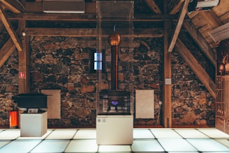 a kitchen with a brick wall
