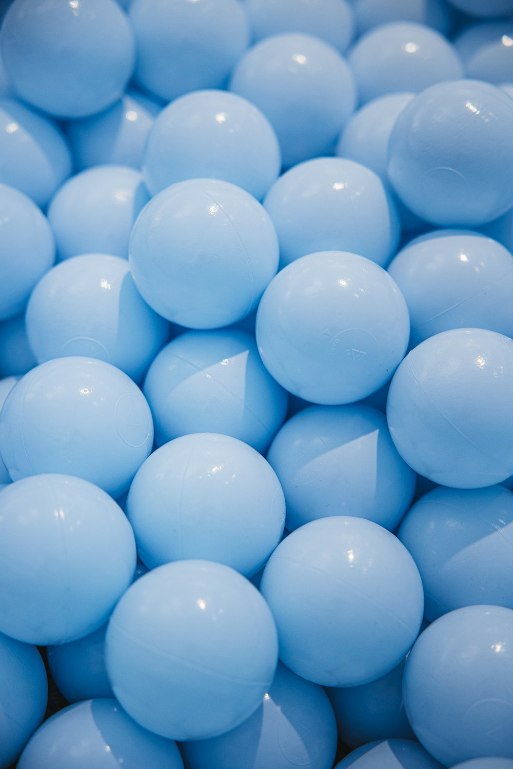 a group of blue balloons