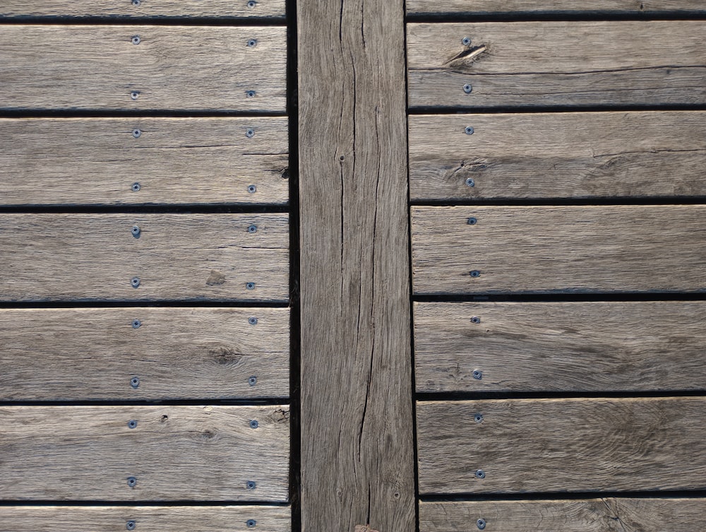 a wood deck with a couple of planks