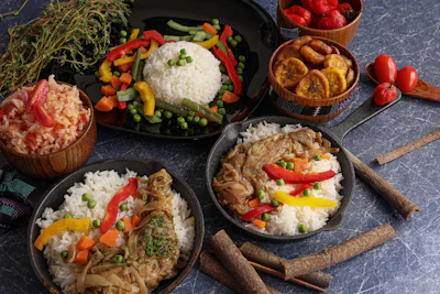 A spread of East African cuisine dishes, evoking a buffet-style local restaurant meal