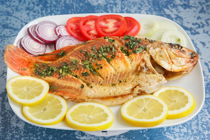 Whole roasted sea bass with herbs and lemon