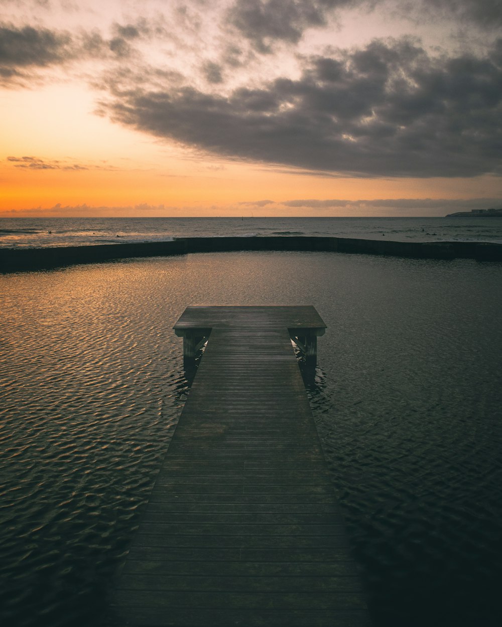 a dock leading out into the water