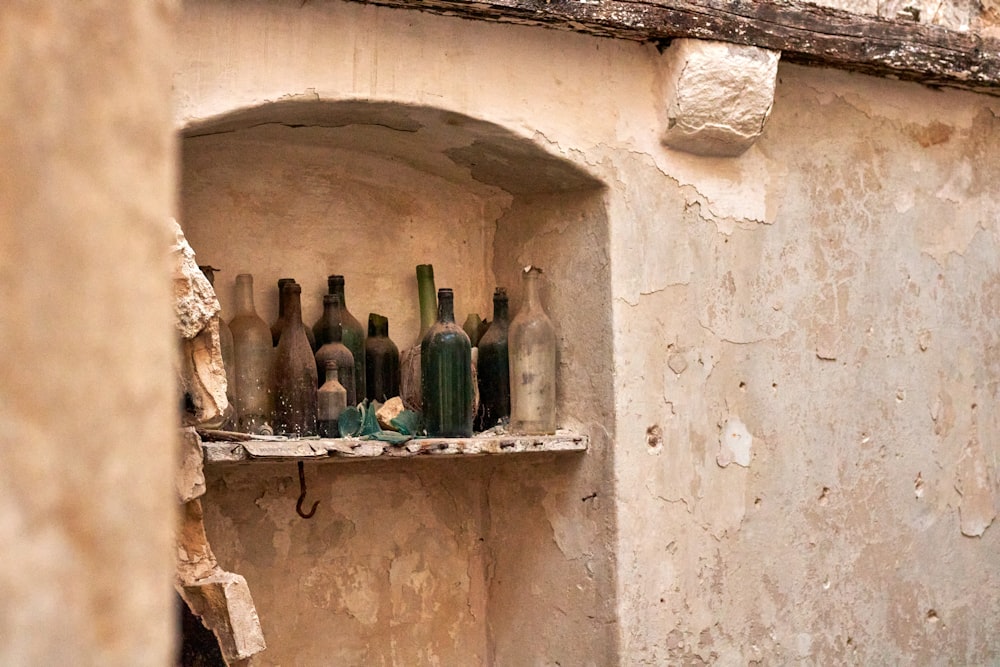 a group of bottles in a window