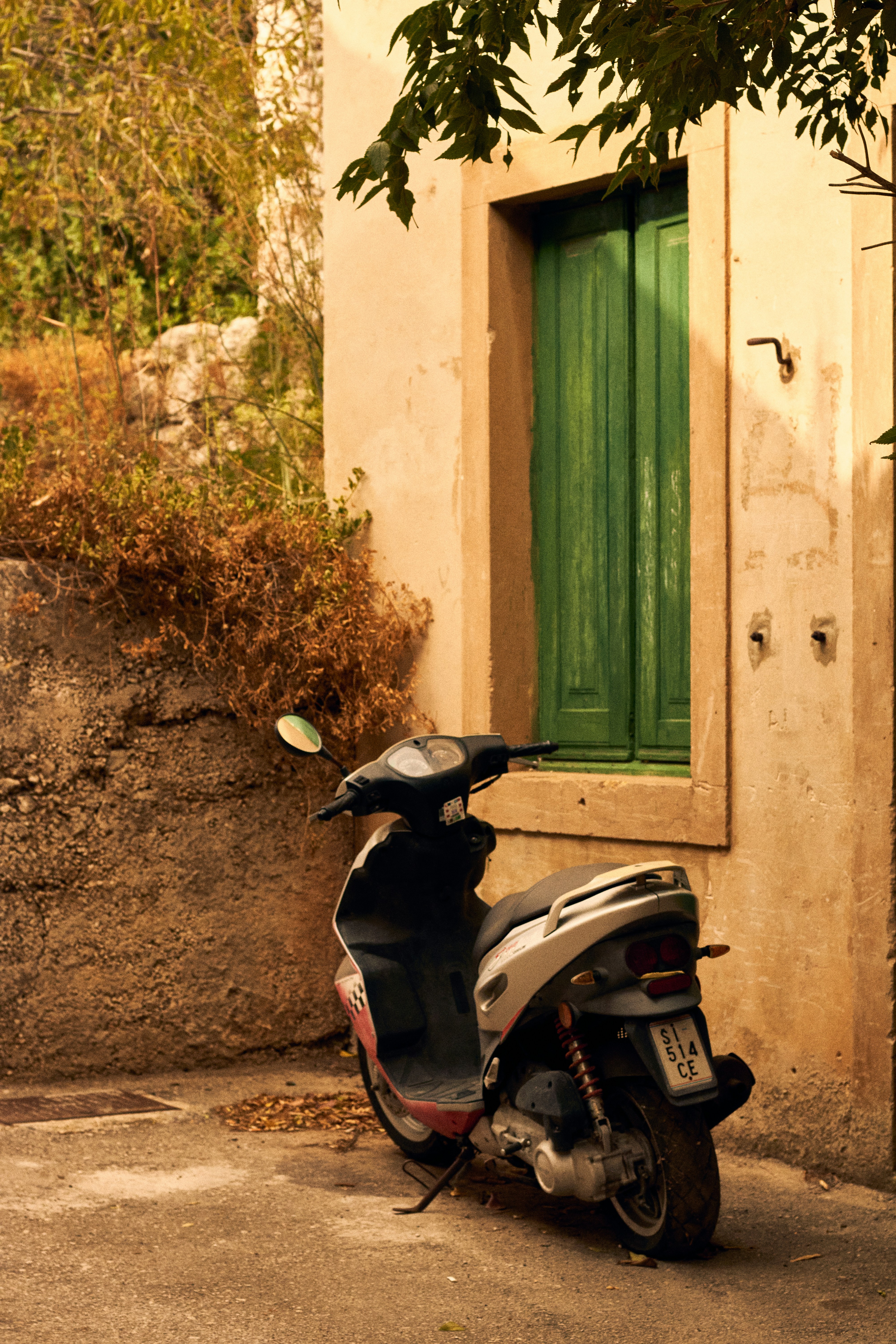 a motorcycle parked outside a building