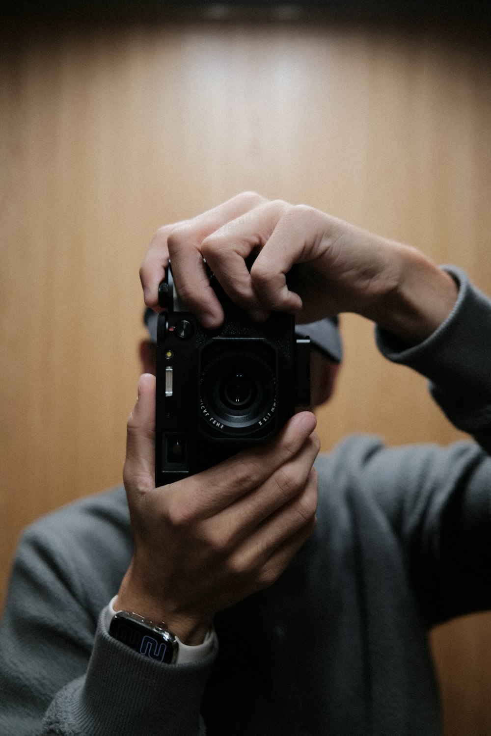 a person holding a camera