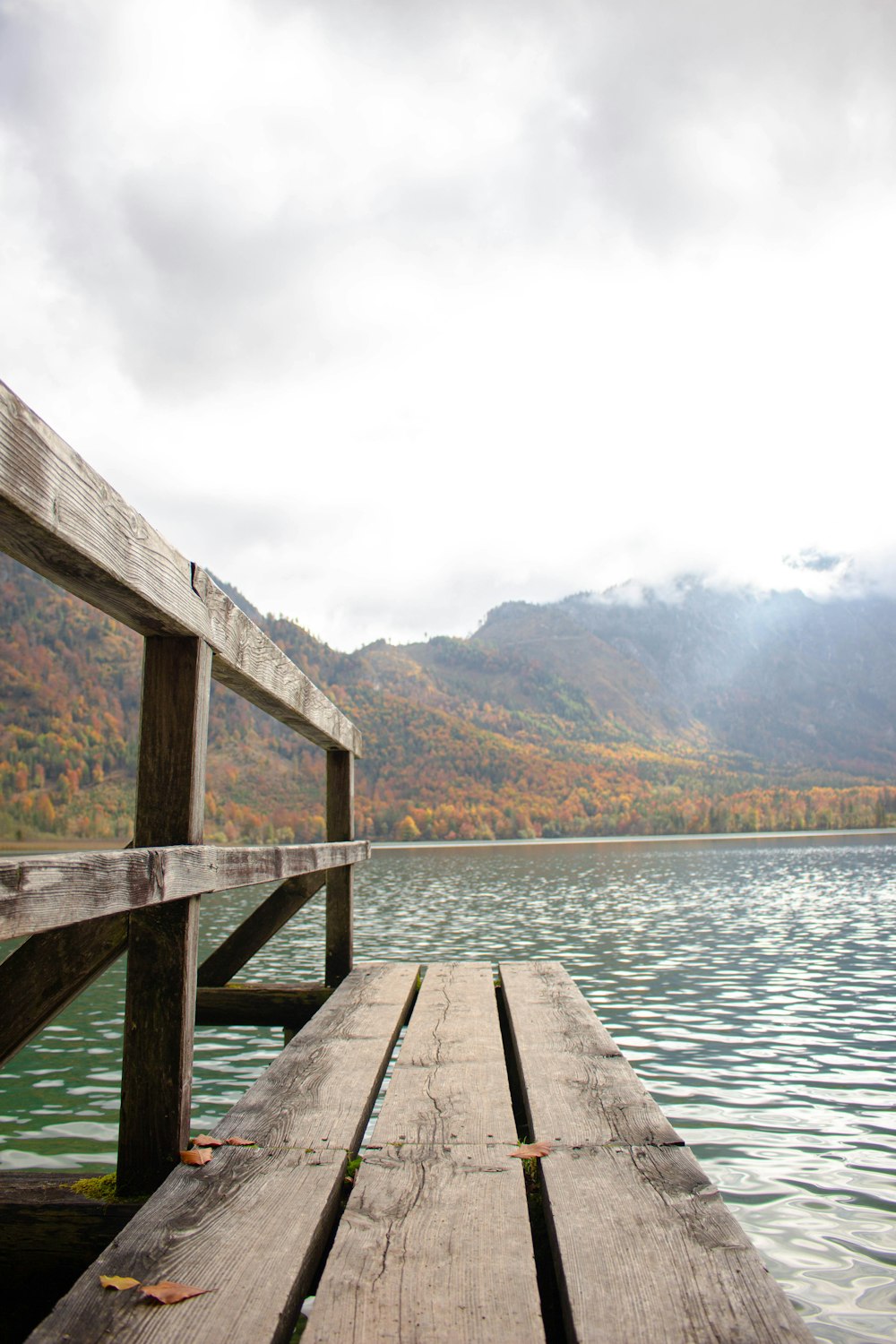 a wooden dock over water