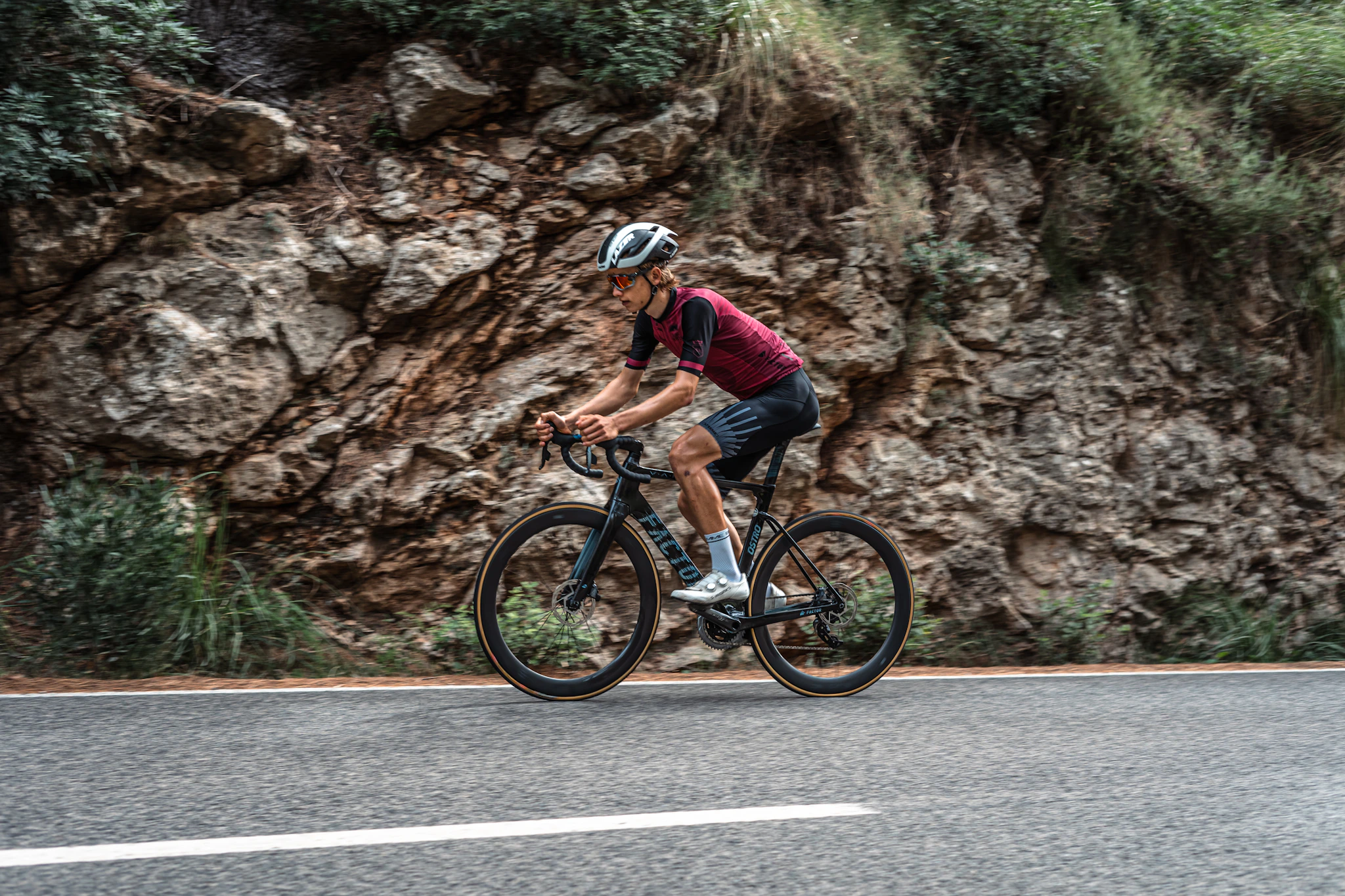 A cyclist riding a mountain road near Caimari on a Mallorca cycling holiday