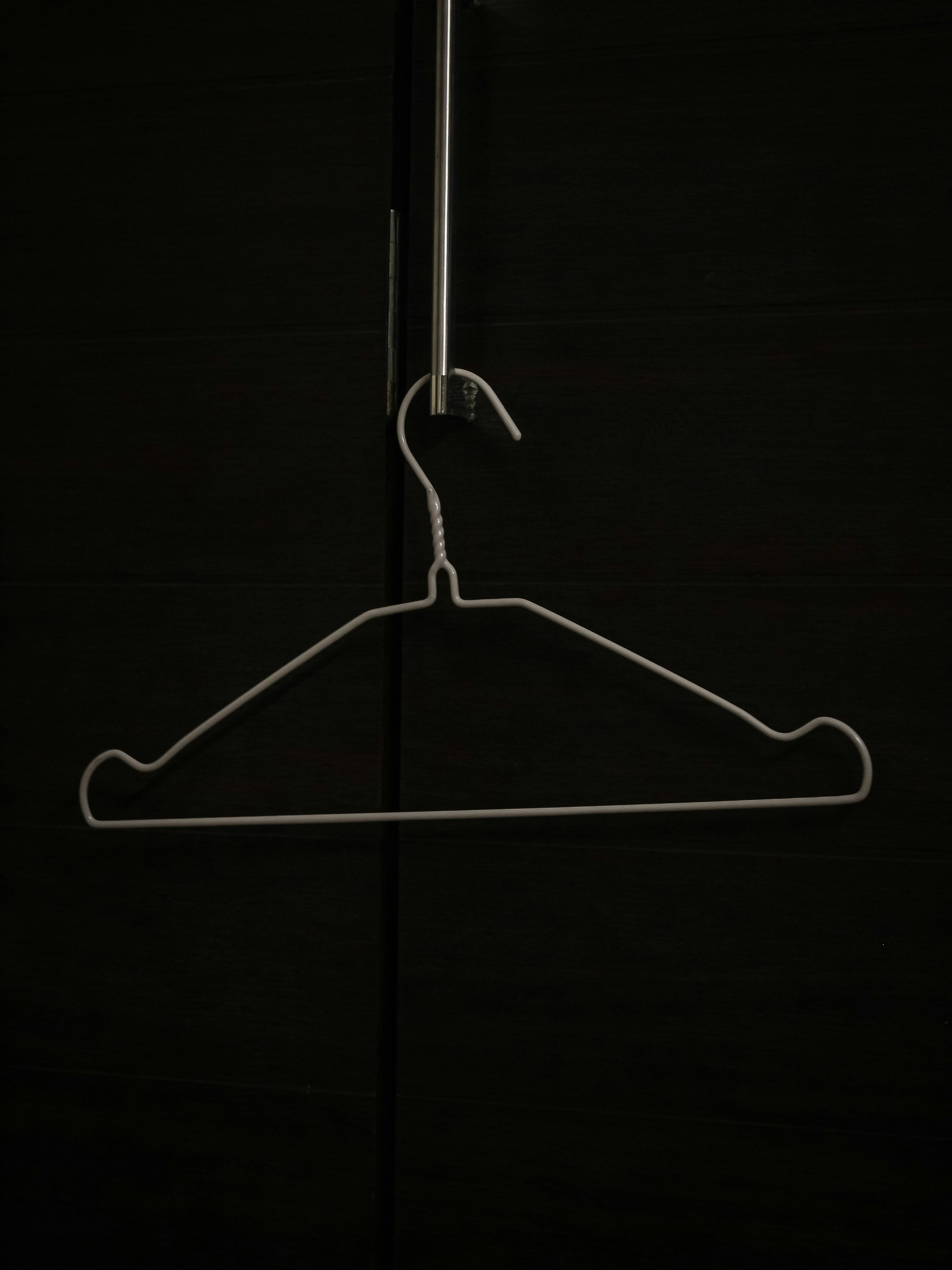 a white spider on a black background