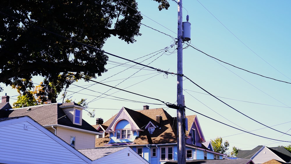 a group of houses with a pole