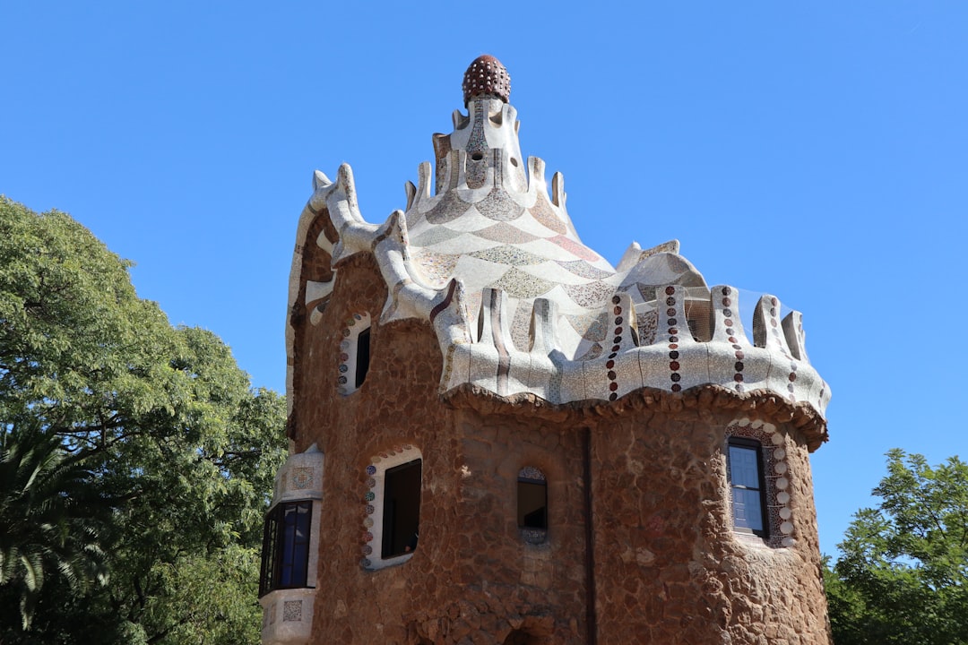 a building with a statue on top,