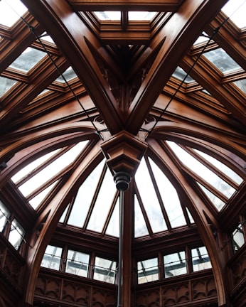 a large wooden ceiling with many windows