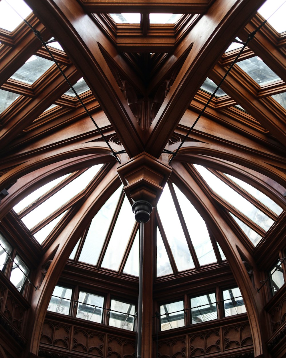 a large wooden ceiling with many windows