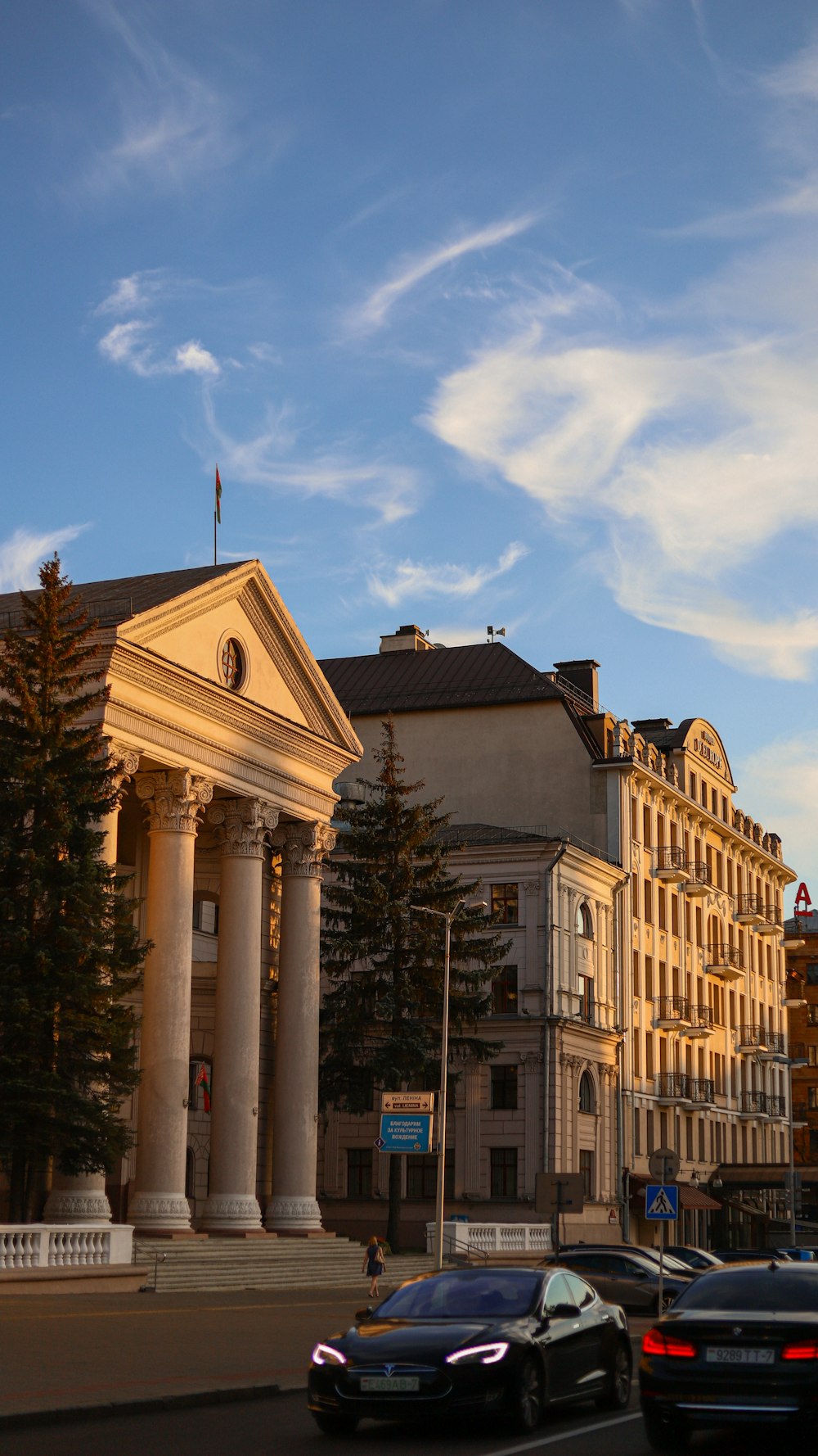 a building with columns and a clock tower