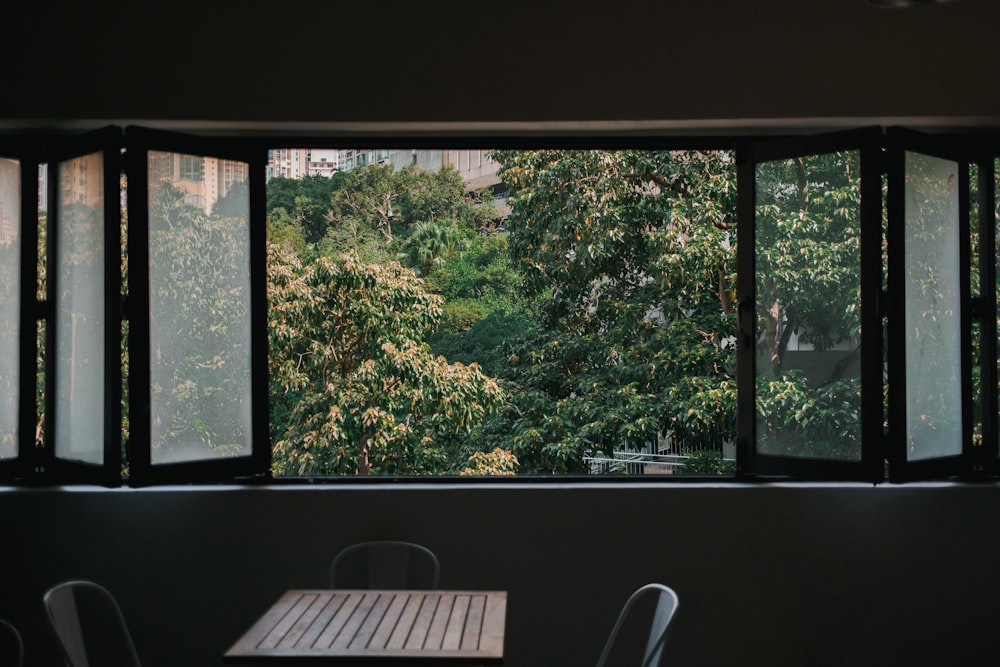 a desktop computer sitting on top of a window