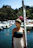 a person standing in front of a body of water
