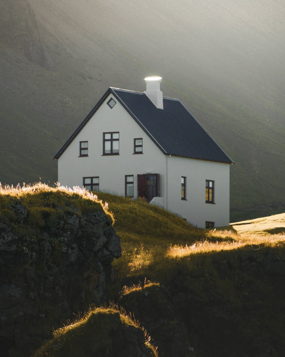 a white house on a hill