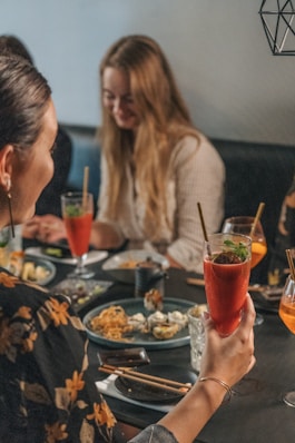 a man and woman eating at a table