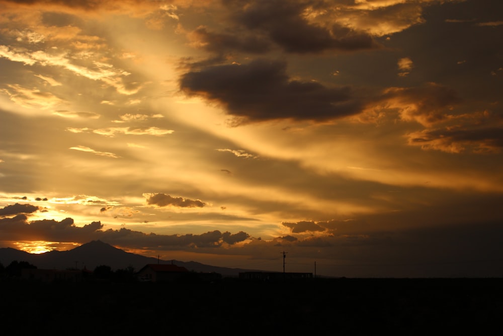 a sunset over a city