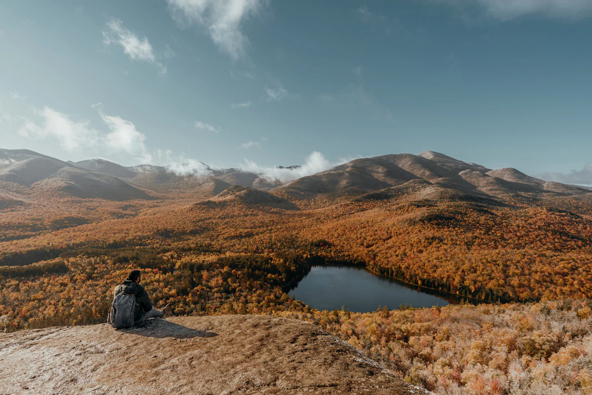 Mountain lake surrounded by Adirondack High Peaks in autumn near Lake Placid, New York