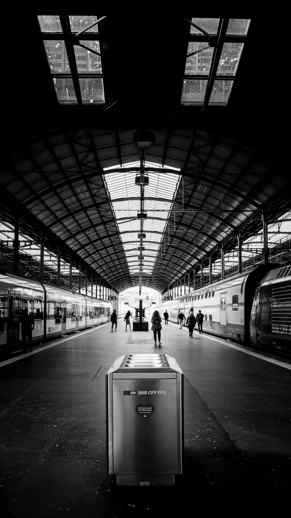 a train station with people