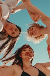 a group of women posing for a photo
