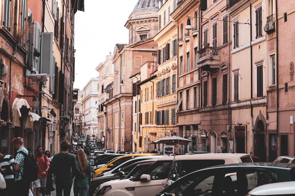 a busy street with cars and people