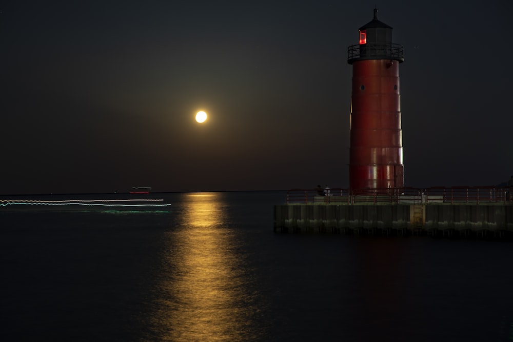 a lighthouse on a pier