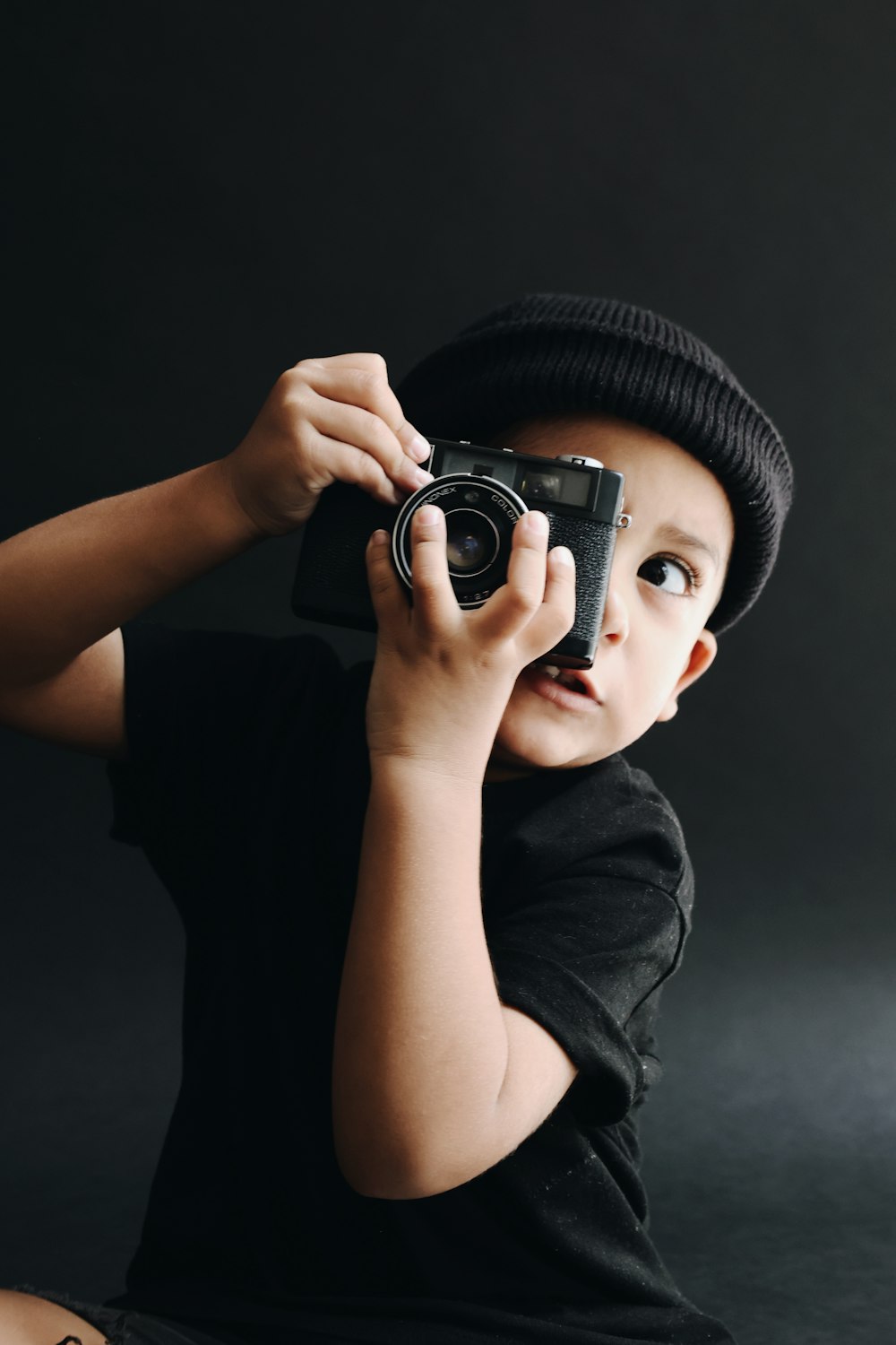 a person holding a camera