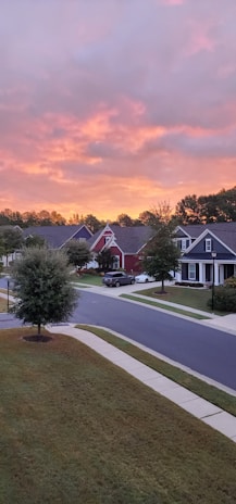 Evening shot of a quiet neighborhood street in California, highlighting well-maintained homes.