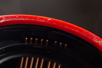 Close-up of high-tech electromechanical components with subtle gold accents.