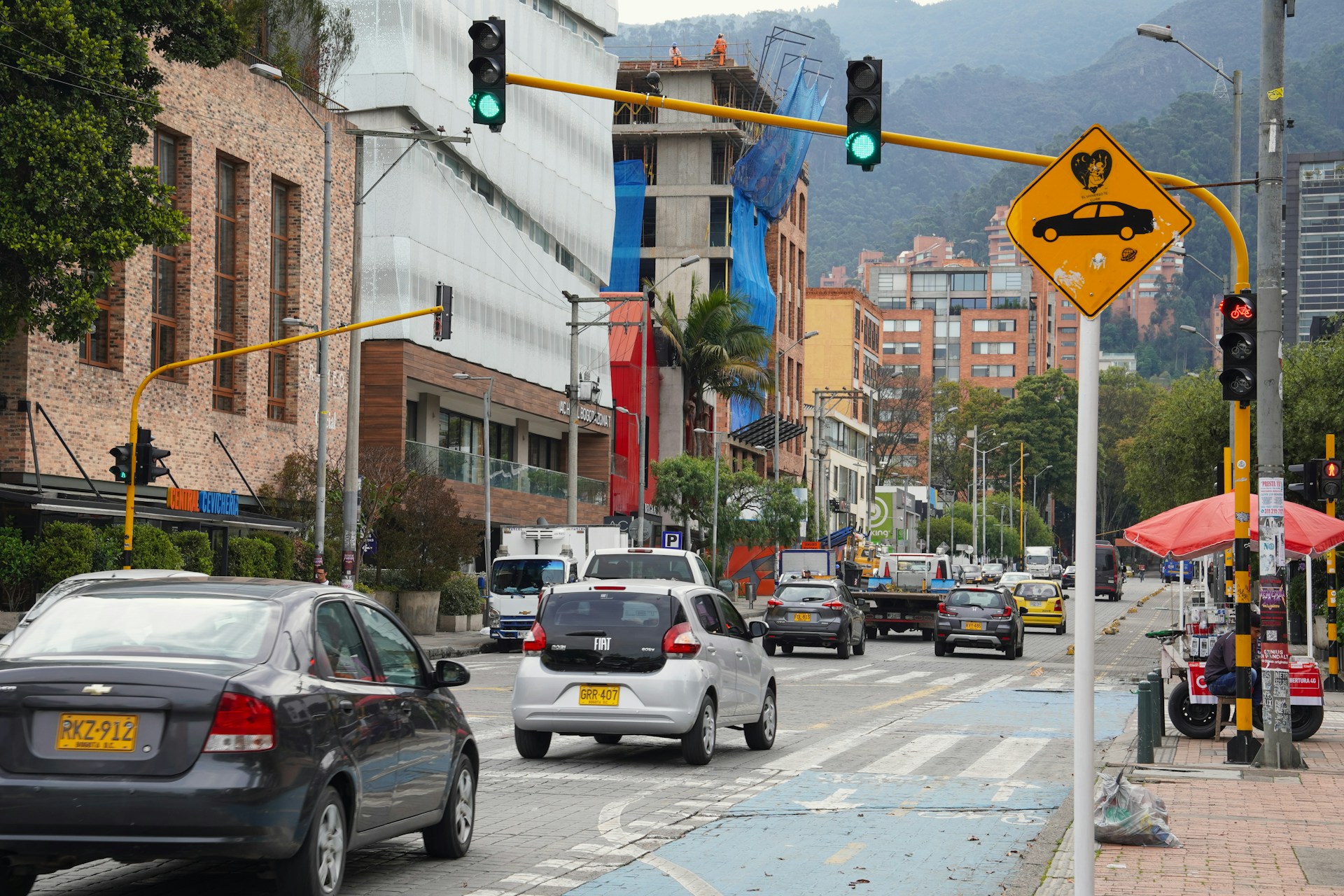 cars driving on a street