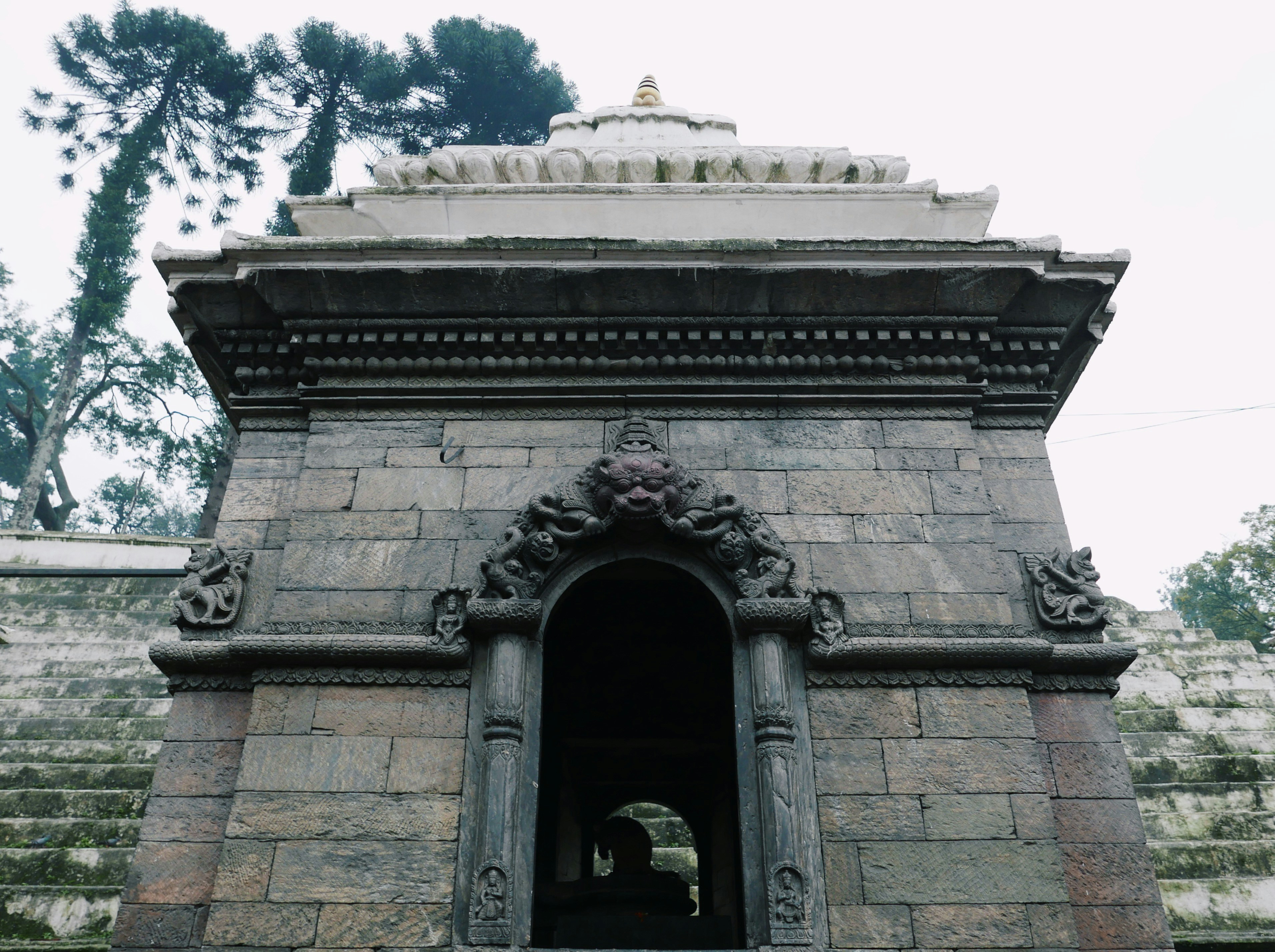 a stone building with a large archway