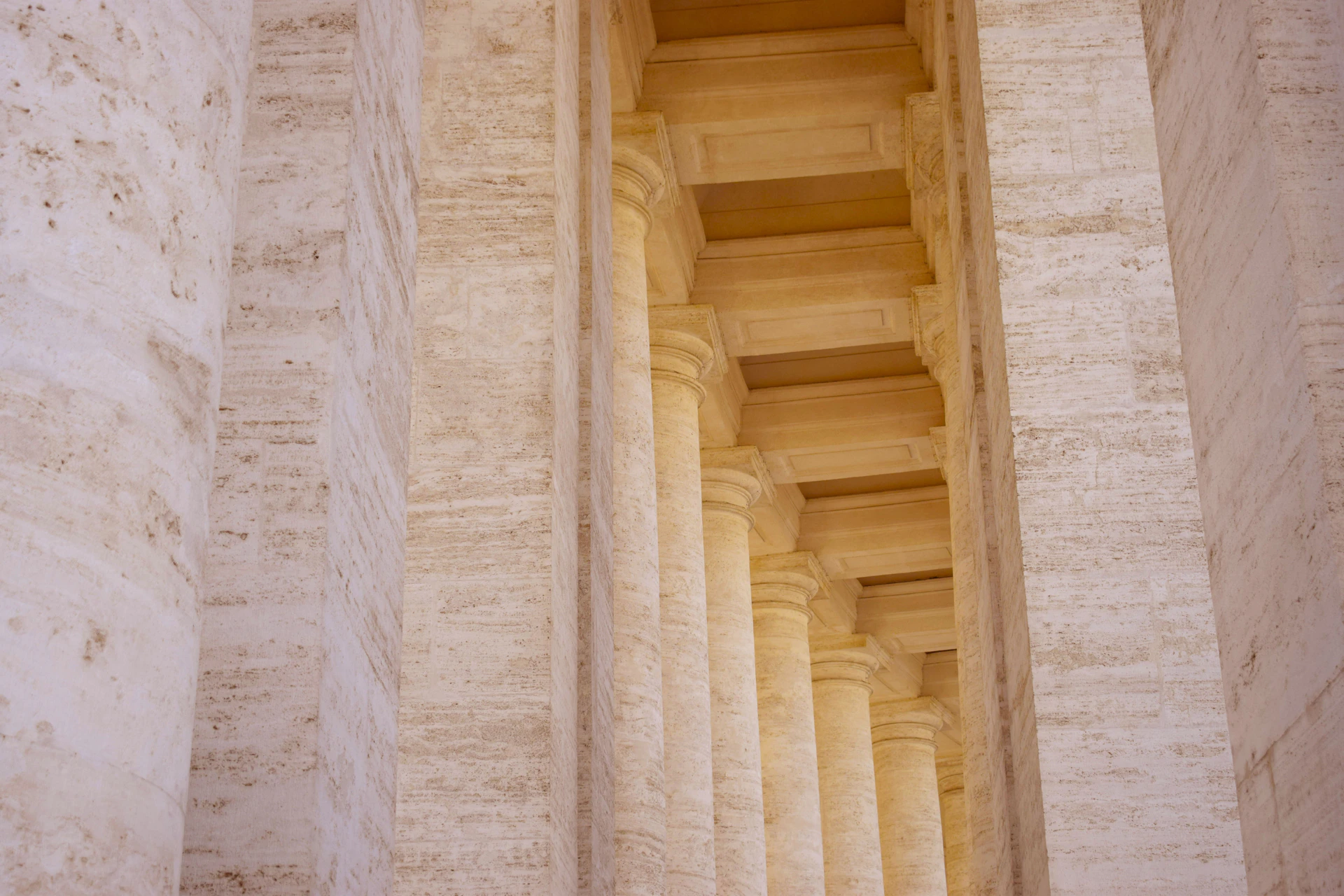 a wooden staircase with white walls