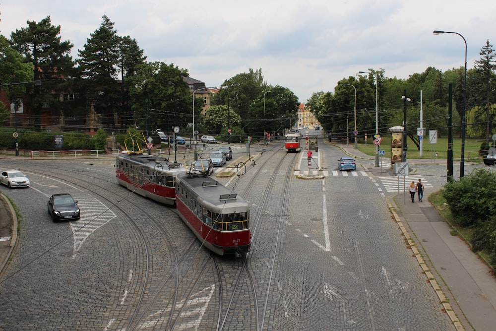 a couple of trains on tracks