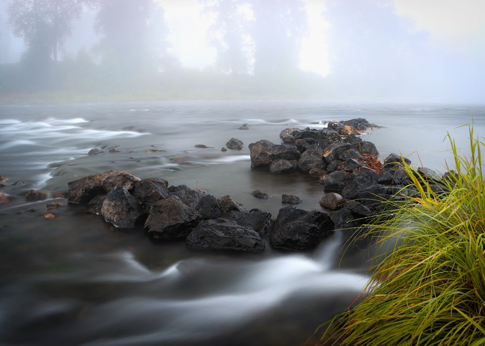 a rocky beach with waves crashing