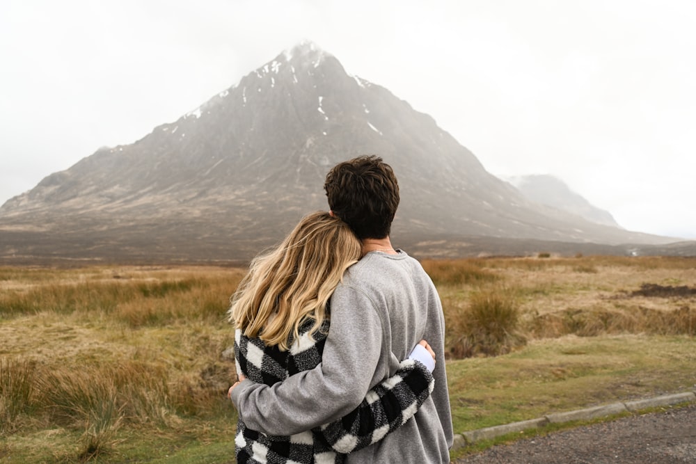 a man and woman kissing