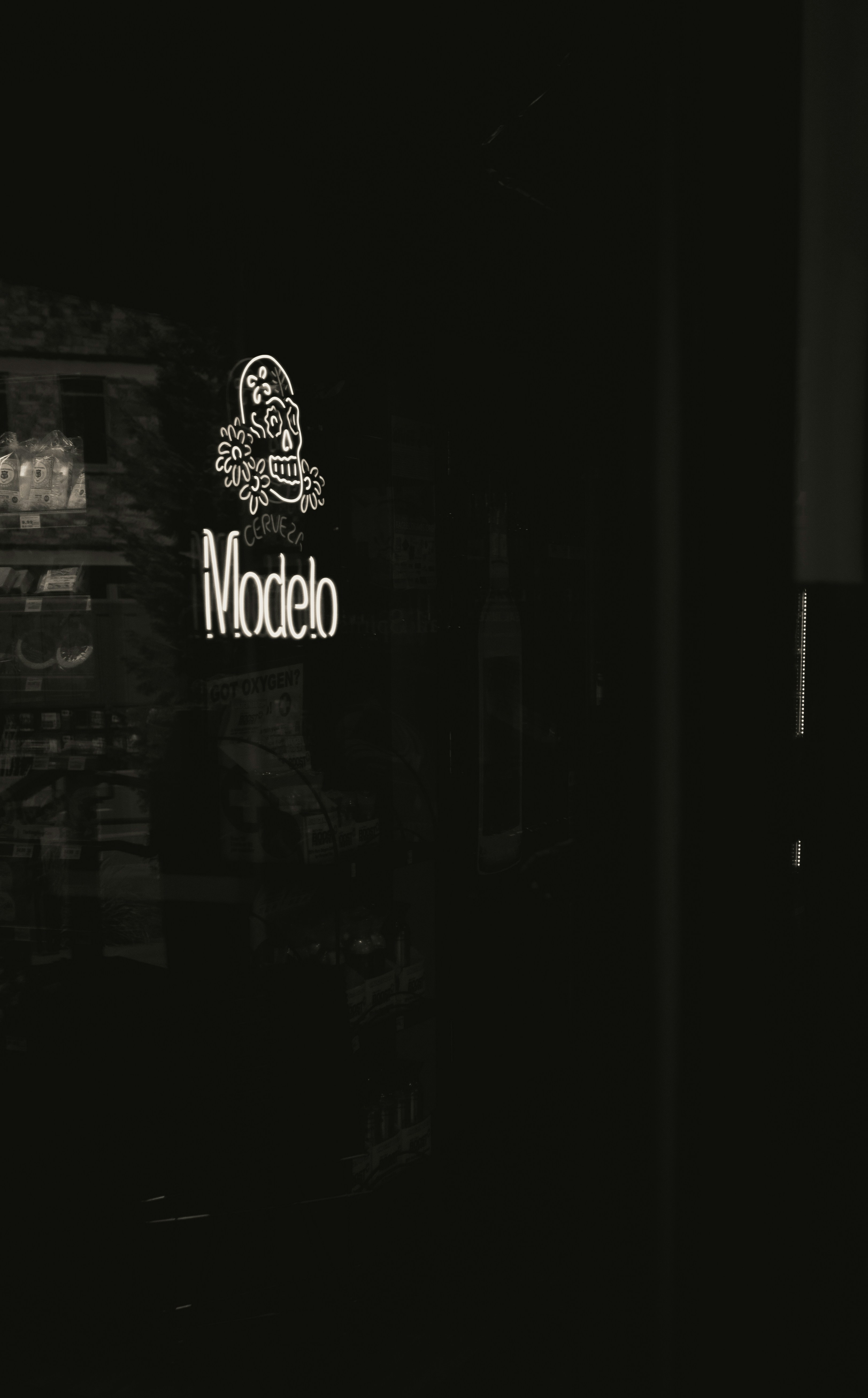 a black and white photo of a city at night