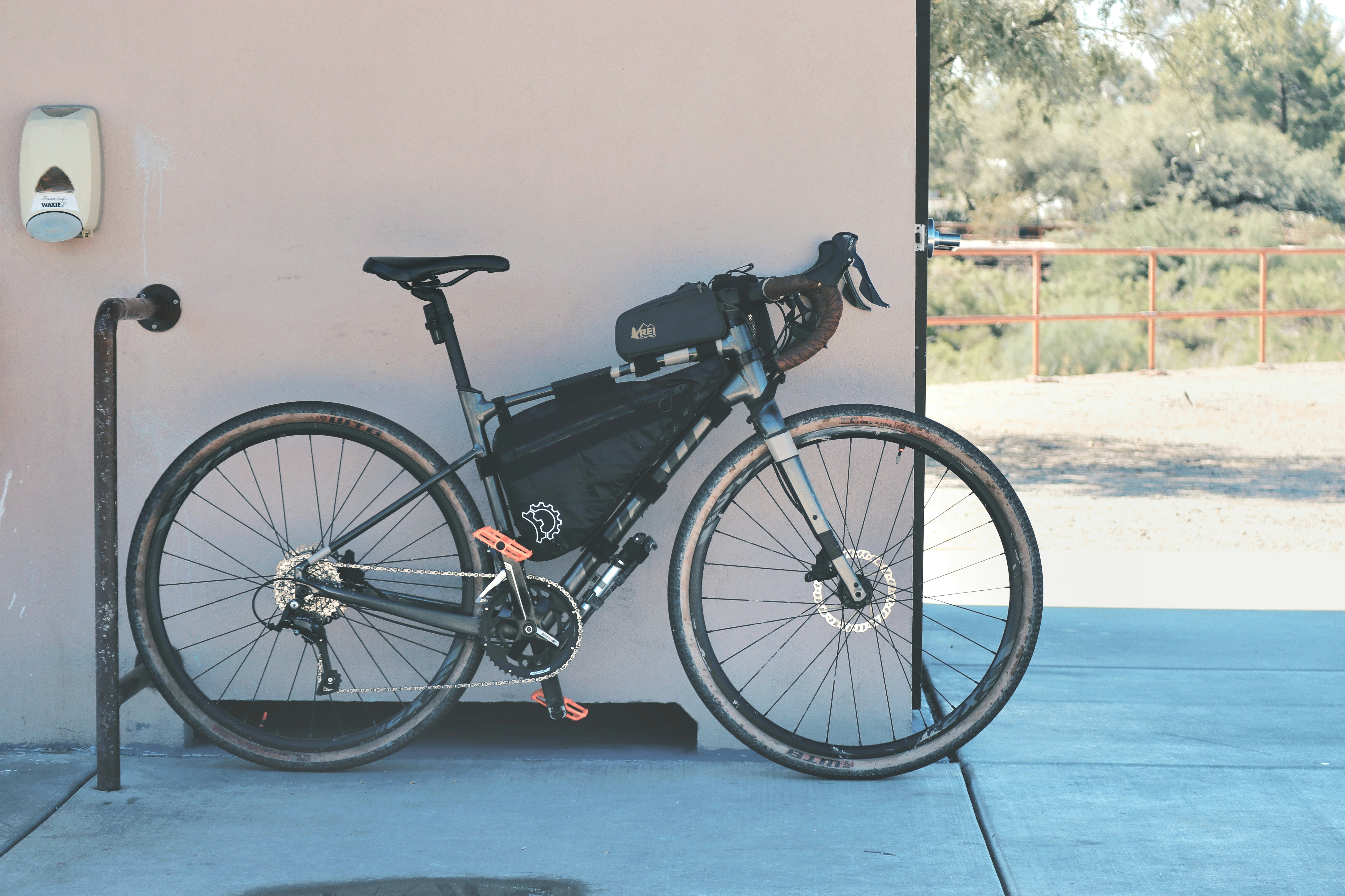 a bicycle parked on a wall