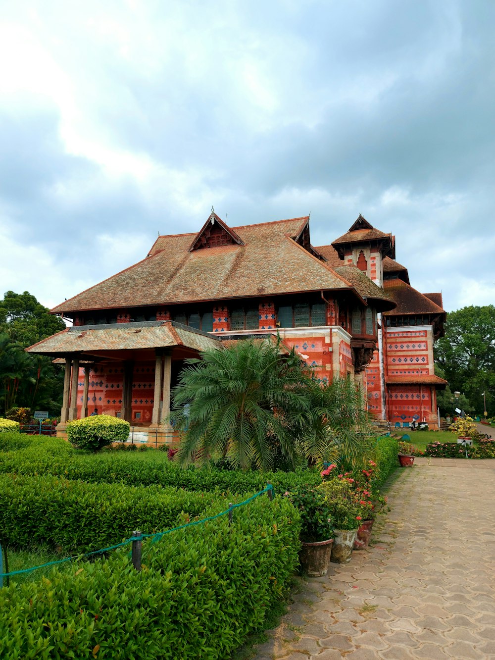 a house with a fence and trees