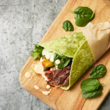 a sandwich on a cutting board