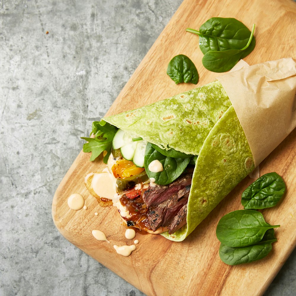 a sandwich on a cutting board