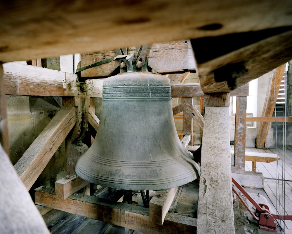 a bell on a wooden structure