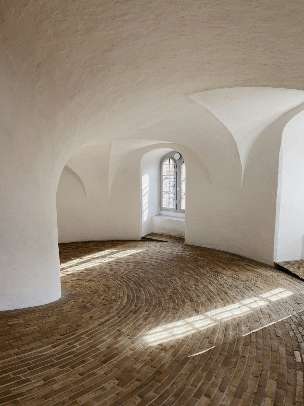 a hallway with a rug