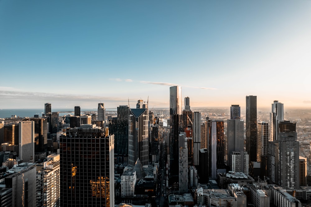 a city skyline with a blue sky